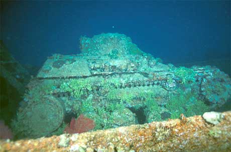 Japanese 2-man midget tank on the deck of the Nippo Maru wreck, Truk Lagoon, Micronesia. Image taken by Clark Anderson/Aquaimages.