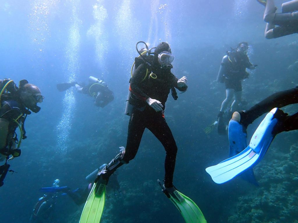 Divers waiting exit bluehole